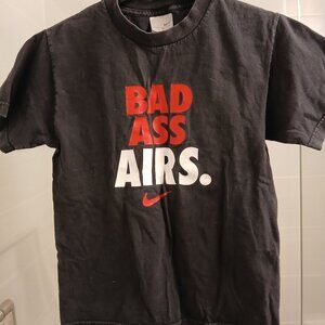 Vintage Nike Black and Red Top with Bold Print